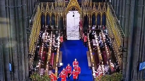 WATCH: The Grim Reaper walks by as Charles is crowned the new King. via #ToreSays