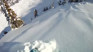 Daredevil Snowboarder Has Close Encounter With Mini Avalanche