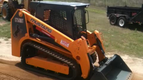 Mustang 1750RT Compact track loader when it was new long time ago