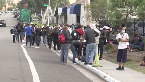 SAN DIEGO, CALIFORNIA. Unmarked Busses Dropping Off Hundreds Of Illegal Migrants Into The City