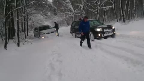2008 Subaru forester pulling 2015 kia sorento at deep snow