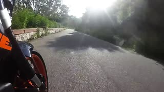Motorcyclist Narrowly Avoids Head on Collision