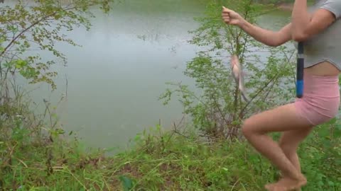 Girl catching BIG TILAPIA FISH WITH HOOK