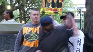 Street Preacher Blocks Punch