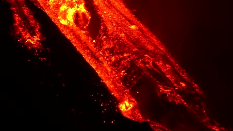 Italy’s Mount Etna spurts lava into night sky