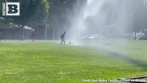 THAT'S A BIG WATER GUN! Firefighters Help Local Kids Beat the Heat in Illinois