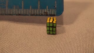 Man holds world record for creating smallest Rubik's cube ever