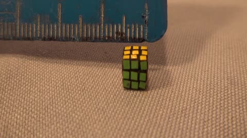 Man holds world record for creating smallest Rubik's cube ever