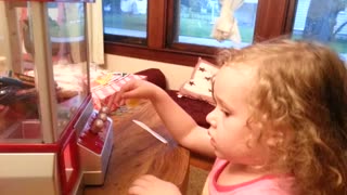 Little Girl 'Easily' Wins The Claw Game