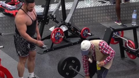 Grandpa explaining how weights are carried in the Gym