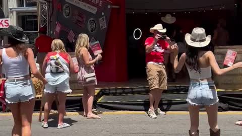 Dancers at AARP booth during CMA Fan Fest 2022, Nashville, Tennessee