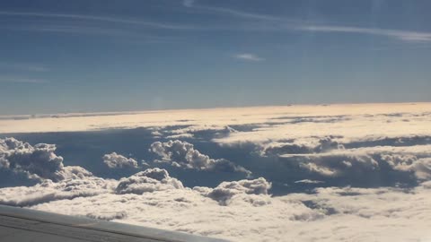 View Of Clouds From An Aircraft II SpaceWorld2k23