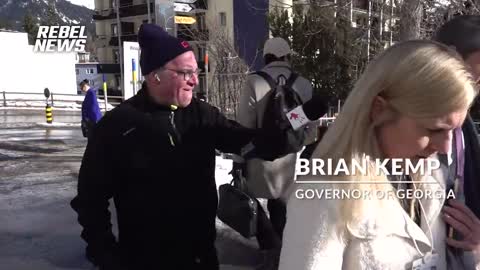 What is Brian Kemp doing in Davos?