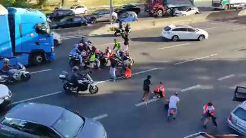 Climate activists reliable to block a avenue in Portugal.