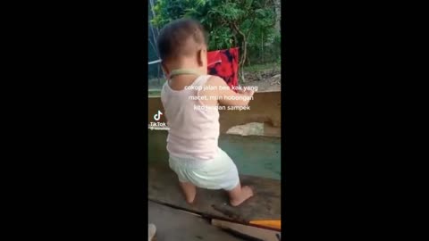a child who always listens to musi reflex dancing coolly