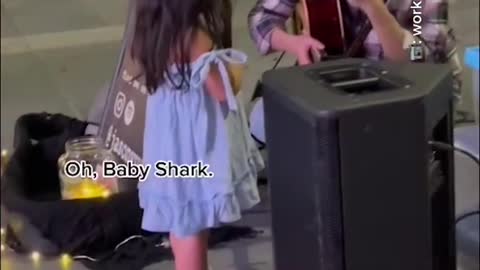 Orchard busker fulfills toddler's 'Baby Shark" song request