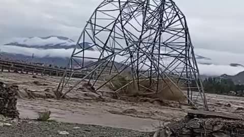 Falling of electric tower by flood water