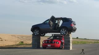 Stunt Man Flies Through Car
