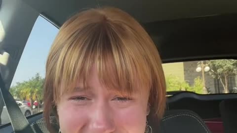 Woman Has Hilarious Reaction to Terrible Haircut