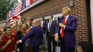 WATCH- Trump Tosses Footballs To Cheering Crowd In Iowa