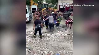 Handout video shows man rescued from Donetsk rubble