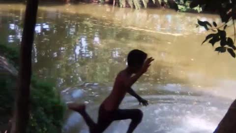 In the scorching heat of summer, the naugty children of the village started mischief in the pond.