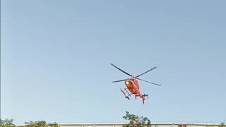medical helicopter takeoff from helipad