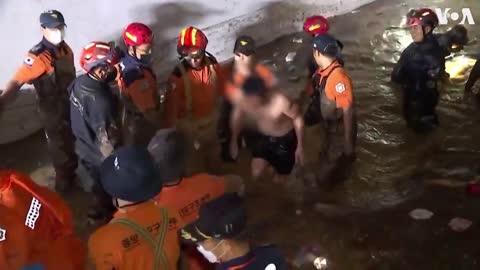 Rescuers Save Two Victims from Flooded Car Park in South Korea