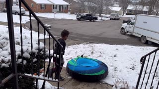 Cam tries his new snow sled