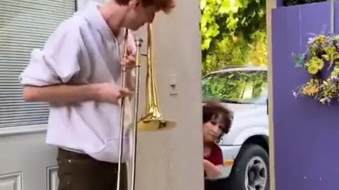 A guy soundtracking his Mom's life with his trombone...