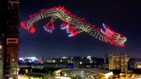 20 sec clip Drone Formation of a Dragon in China /Mirrored/