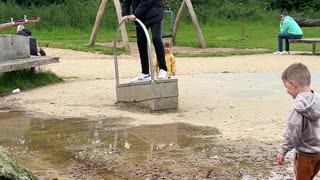 Mischievous Uncle Sprays Nephew With Water