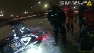 Bodycam footage shows rescue crews save a woman whose car was submerged in icy pond