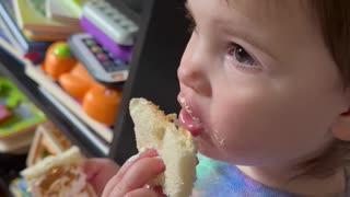 This is how she eats her sandwich?