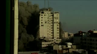 Gaza building collapsing after airstike