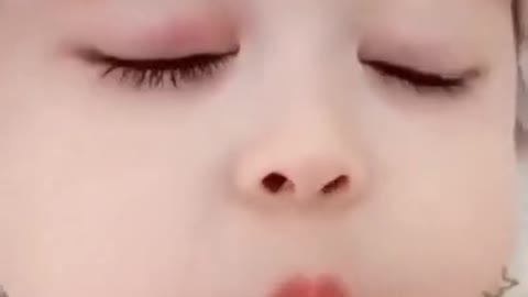 cute baby kissing