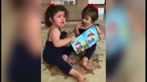 Funny 2 little kids fighting over toys
