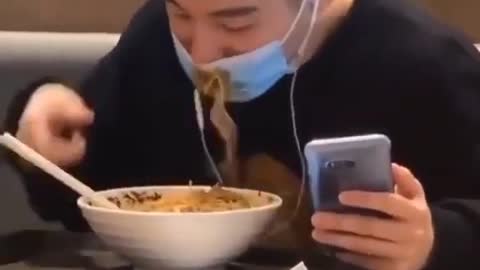 Funny mask man eating a noodles protect covid 19