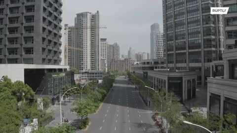 . Drone footage shot on Friday shows the megacity with empty streets..