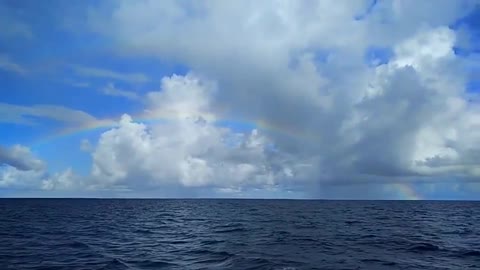 seaside cloud rainbow