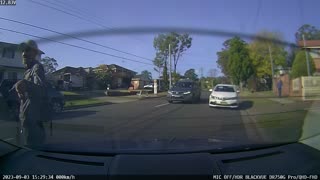Inattentive Driver Collides With Parked Car