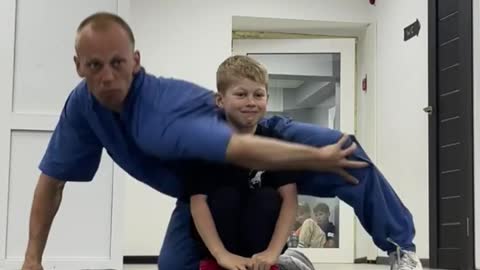 Kid And Coach Perform Incredible Illusion Dance Routine