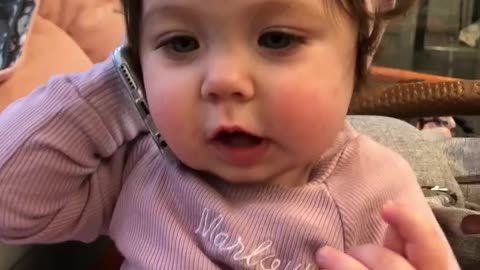 Cute Baby Girl Hilariously Talks To Dad On The Phone