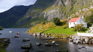 boats in a bay of the village a in norway