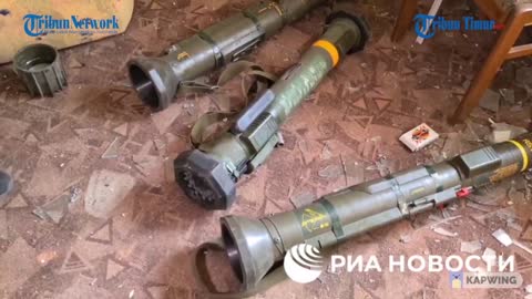 Russian forces find Anti- tank weapons at a destroyed Ukranian position inside the house