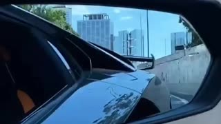 driving Lamborghini on the city highway