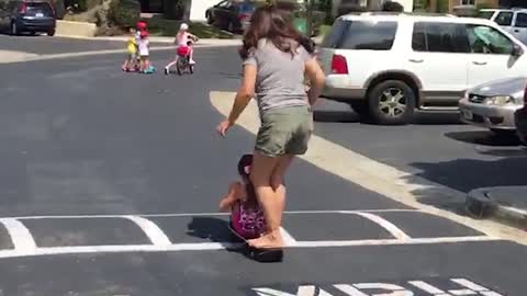 Mom and Daughter Crash HARD After Attempting Gnarly Tandem Skateboard Trick