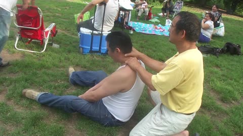 Luodong Briefly Massages Man In Undershirt At The Park