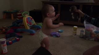 Baby's first steps incredibly captured on camera