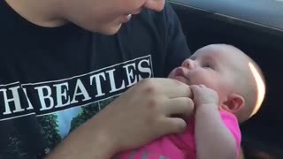 Daddy sings to his daughter